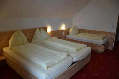 Ein Bett oder Betten in einem Zimmer der Unterkunft Gasthof-Pension Urzn