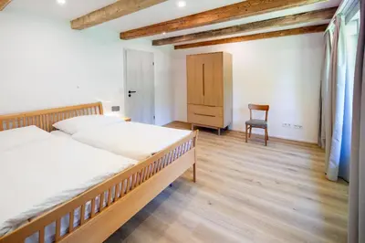 Ein Bett oder Betten in einem Zimmer der Unterkunft Familienfreundliches Chalet mit Sauna & Kamin 5 Minuten zum Skigebiet
