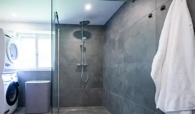 Ein Badezimmer in der Unterkunft Familienfreundliches Chalet mit Sauna & Kamin 5 Minuten zum Skigebiet