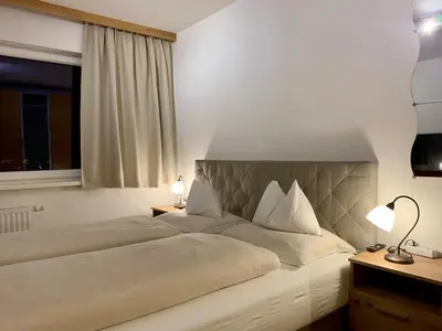 Ein Bett oder Betten in einem Zimmer der Unterkunft Alm-Lodge Flachau Ski-InSki-out