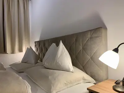 Ein Bett oder Betten in einem Zimmer der Unterkunft Alm-Lodge Flachau Ski-InSki-out