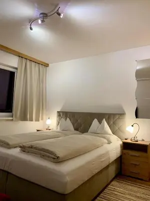 Ein Bett oder Betten in einem Zimmer der Unterkunft Alm-Lodge Flachau Ski-InSki-out