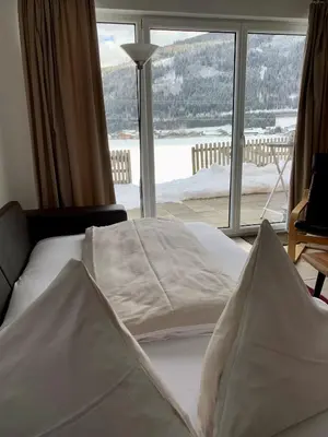 Ein Bett oder Betten in einem Zimmer der Unterkunft Alm-Lodge Flachau Ski-InSki-out