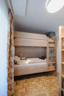 Ein Bett oder Betten in einem Zimmer der Unterkunft ELLIS Apartment