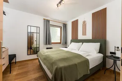 Ein Bett oder Betten in einem Zimmer der Unterkunft Appartement Alpenblick by Schladming-Appartements
