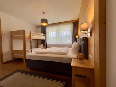 Ein Bett oder Betten in einem Zimmer der Unterkunft Winzerchalet