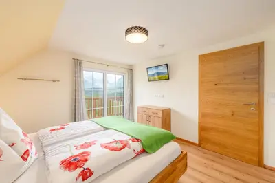 Ein Bett oder Betten in einem Zimmer der Unterkunft Ferienhaus Daum