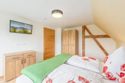 Ein Bett oder Betten in einem Zimmer der Unterkunft Ferienhaus Daum