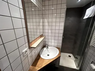 Ein Badezimmer in der Unterkunft Kitz-Studio