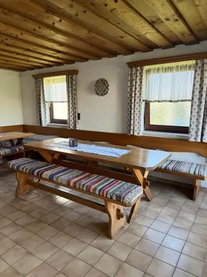 Ein Sitzbereich in der Unterkunft Gemütliches Vierbettzimmer mit Bad und Küche