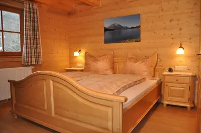 Ein Bett oder Betten in einem Zimmer der Unterkunft Bänklingerhütte