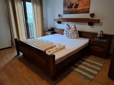 Ein Bett oder Betten in einem Zimmer der Unterkunft Urlaub am Liasnhof