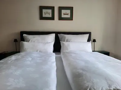 Ein Bett oder Betten in einem Zimmer der Unterkunft Marktplatz Apartment