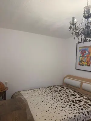 Ein Bett oder Betten in einem Zimmer der Unterkunft Komfortzimmer im modernen Stil