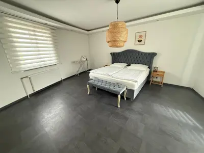 Ein Bett oder Betten in einem Zimmer der Unterkunft Home