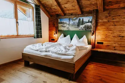 Ein Bett oder Betten in einem Zimmer der Unterkunft Chalet Hoamatgfühl - by myNests