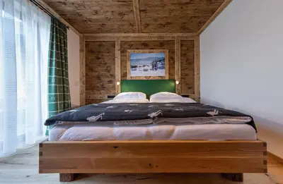 Ein Bett oder Betten in einem Zimmer der Unterkunft Chalet Hoamatgfühl - by myNests