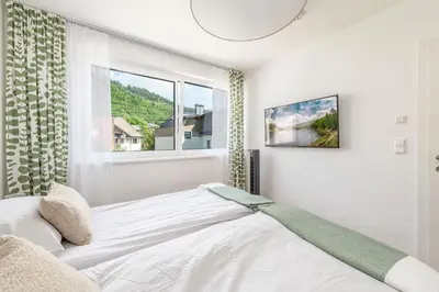 Ein Bett oder Betten in einem Zimmer der Unterkunft Neualm 5 - by myNests