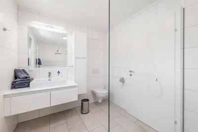 Ein Badezimmer in der Unterkunft Neualm 5 - by myNests