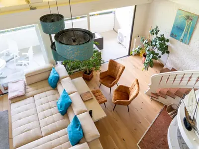 Ein Sitzbereich in der Unterkunft Apartment Penthouse Deluxe mit Galerie by Interhome