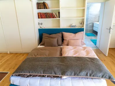 Ein Bett oder Betten in einem Zimmer der Unterkunft Apartment Penthouse Deluxe mit Galerie by Interhome