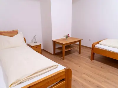 Ein Bett oder Betten in einem Zimmer der Unterkunft Apartment Wohnung Garten 2 Seeblick by Interhome