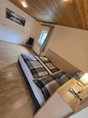 Ein Bett oder Betten in einem Zimmer der Unterkunft Goisernblick - Apartments bei Hallstatt