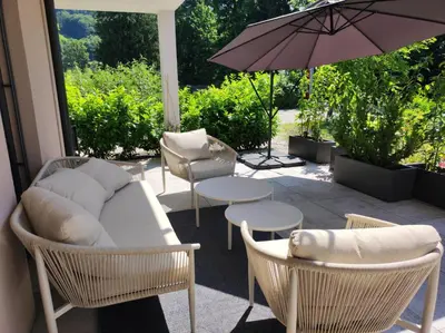 Ein Sitzbereich in der Unterkunft SINGULAR - Mountainview Apartments
