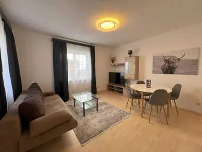 Ein Sitzbereich in der Unterkunft Apartment Theresa by Landluft