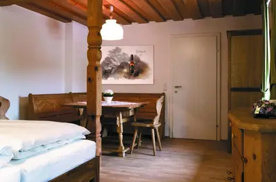 Ein Bett oder Betten in einem Zimmer der Unterkunft Bierhotel Ranklleiten Almtal