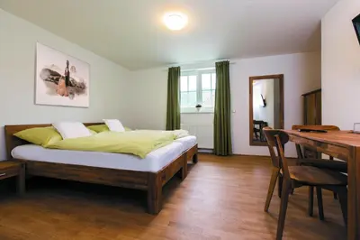 Ein Bett oder Betten in einem Zimmer der Unterkunft Bierhotel Ranklleiten Almtal