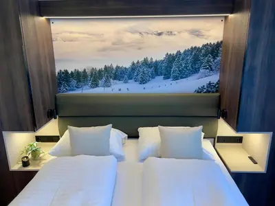 Ein Bett oder Betten in einem Zimmer der Unterkunft Gipfelglück