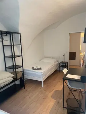 Ein Bett oder Betten in einem Zimmer der Unterkunft room4you Lambach