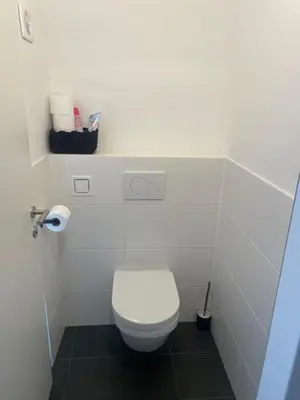 Ein Badezimmer in der Unterkunft room4you Lambach