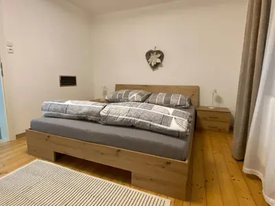 Ein Bett oder Betten in einem Zimmer der Unterkunft Ferienwohnung Linner
