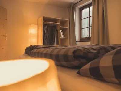Ein Bett oder Betten in einem Zimmer der Unterkunft Postwirt Annaberg