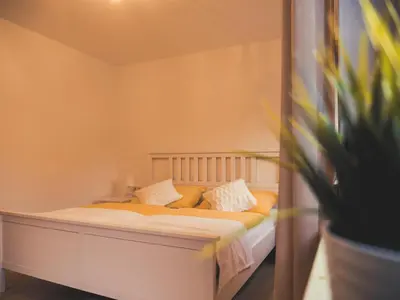 Ein Bett oder Betten in einem Zimmer der Unterkunft Postwirt Annaberg