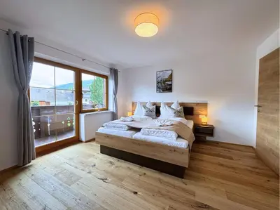 Ein Bett oder Betten in einem Zimmer der Unterkunft Meri Appartements im Lungau nahe Obertauern - öffentliche Verkehrsmittel gratis