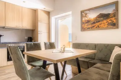 Ein Sitzbereich in der Unterkunft Peterlehen Appartements