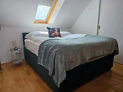 Ein Bett oder Betten in einem Zimmer der Unterkunft Rebenglück
