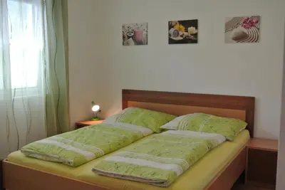Ein Bett oder Betten in einem Zimmer der Unterkunft Appartement Heidi