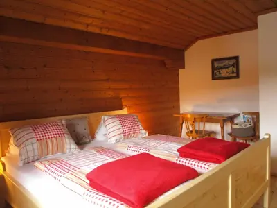 Ein Bett oder Betten in einem Zimmer der Unterkunft Ferienwohnung am Bauernhof Koa