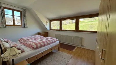 Ein Bett oder Betten in einem Zimmer der Unterkunft Das Steirer-Nest