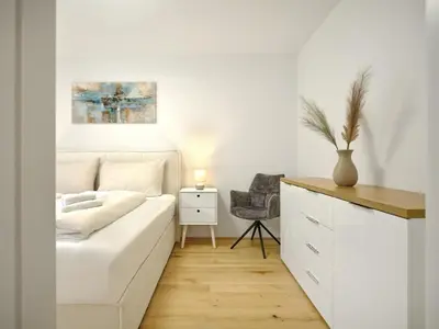 Ein Bett oder Betten in einem Zimmer der Unterkunft Peak view B4 Schladming by AA Holiday Homes