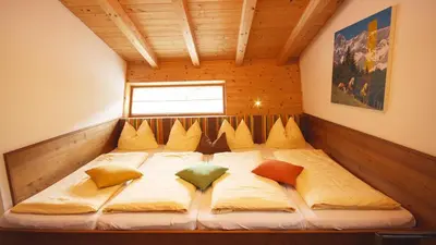 Ein Bett oder Betten in einem Zimmer der Unterkunft Alpin Chalet Filzmoos