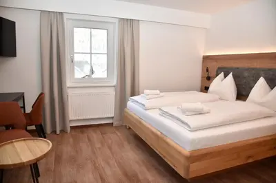 Ein Bett oder Betten in einem Zimmer der Unterkunft Katschbergstubn