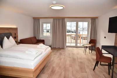 Ein Bett oder Betten in einem Zimmer der Unterkunft Katschbergstubn