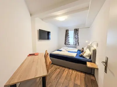 Ein Bett oder Betten in einem Zimmer der Unterkunft Apartment Mentenwirt by Interhome