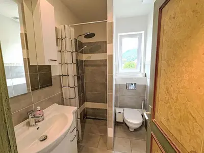 Ein Badezimmer in der Unterkunft Apartment Mentenwirt Suite by Interhome