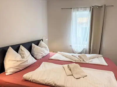 Ein Bett oder Betten in einem Zimmer der Unterkunft Apartment Sarah by Interhome